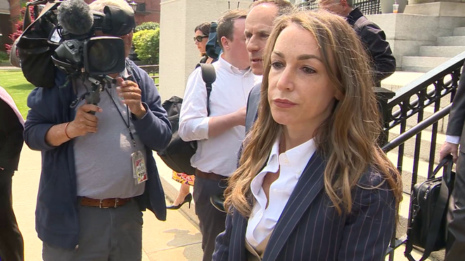 Karen Read, of Mansfield, is pictured outside a courthouse in this file photo. She is accused of killing Braintree native John O'Keefe, a Boston police officer.