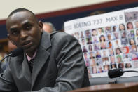 Paul Njoroge testifies during a House Transportation subcommittee hearing on Capitol Hill in Washington, Wednesday, July 17, 2019, on aviation safety. Njoroge lost his wife and three young children on Ethiopian Airlines Flight 302. The plane was a Boeing 737 MAX. (AP Photo/Susan Walsh)