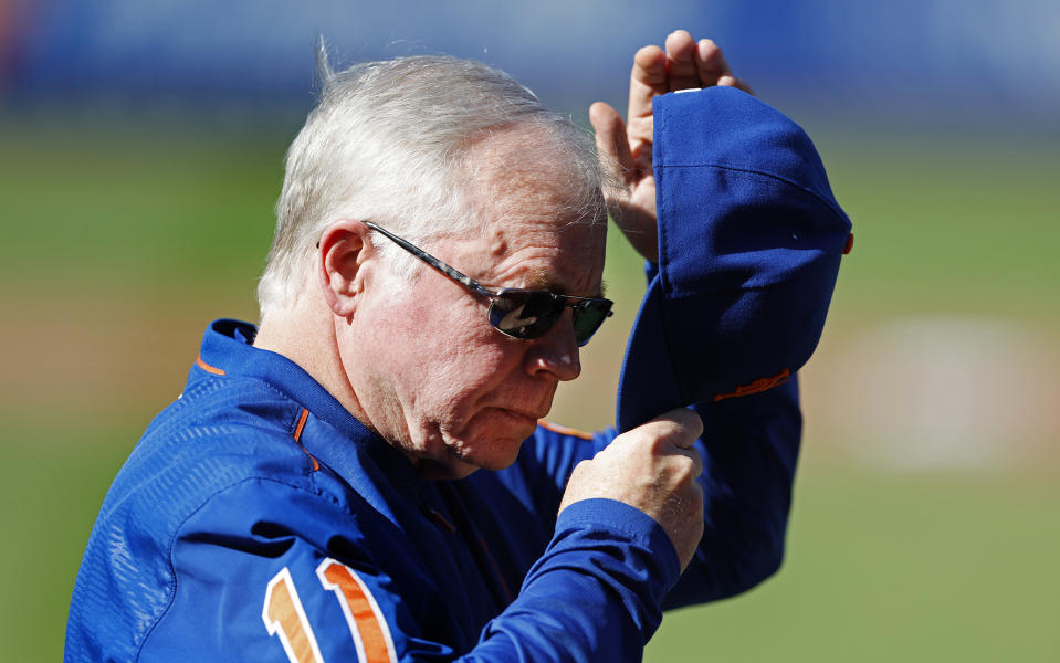 New York Mets manager Buck Showalter adjusts his cap before a baseball game against the Philadelphia Phillies, Sunday, Oct. 1, 2023, in New York. (AP Photo/Noah K. Murray)