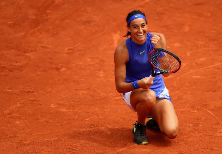 Caroline Garcia smiles after earning a spot in the Round of 16 at the French Open. (Getty Images)