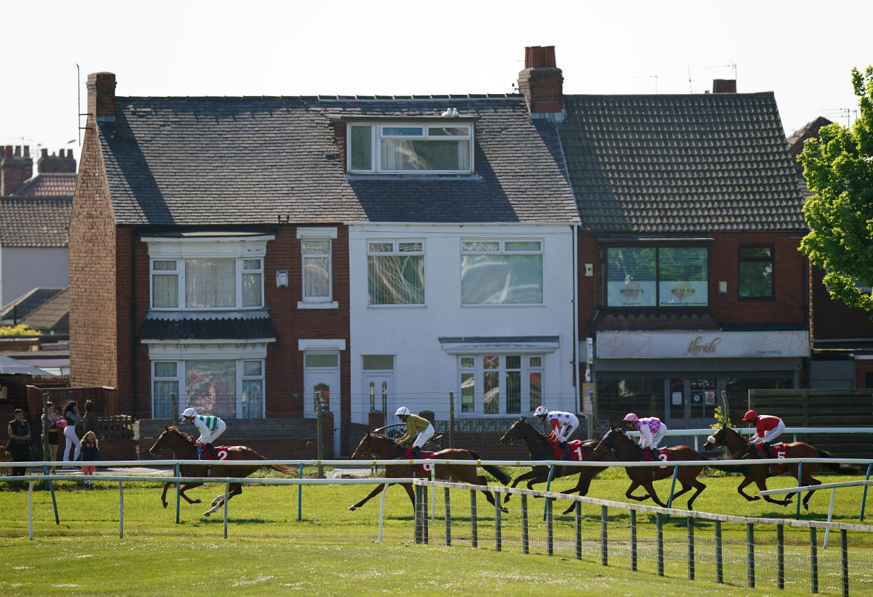 REDCAR, ENGLAND - JUNE 01: Runners and riders in the Follow Redcar Racing On Facebook & Twitter Maiden Handicap at Redcar Racecourse on June 1, 2021 in Redcar, England. (Photo by Mike Egerton - Pool/Getty Images)