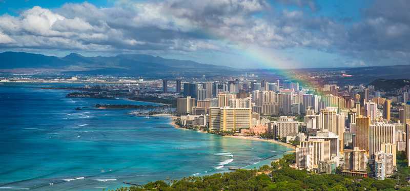 Honolulu coast line with rainbow.