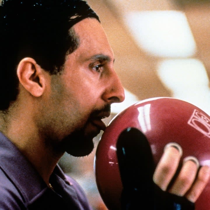 Jesus licking a bowling ball