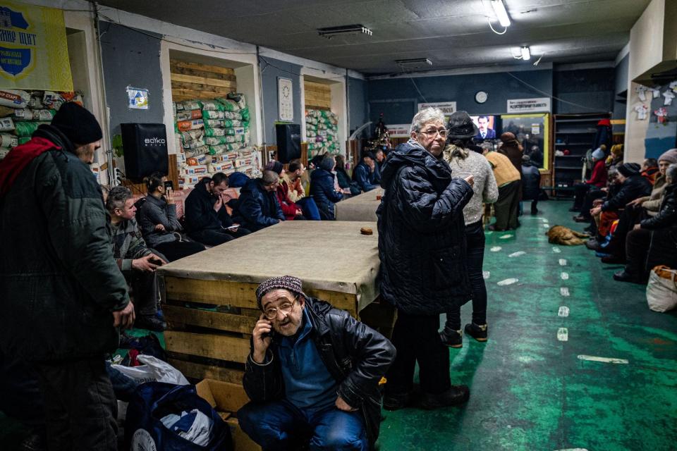 Ukrainians at humanitarian aid center in Bakhmut