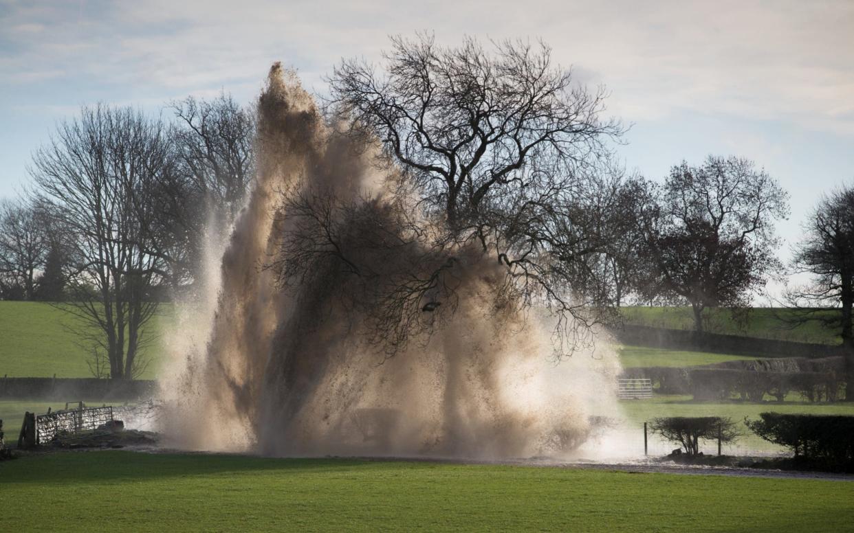 Water bursts from the ground as a pipe was damaged by farmers - Rod Kirkpatrick/F Stop Press