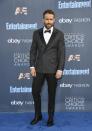 <p>Ryan looked dapper in a dark grey Brunello Cucinelli suit. <i>[Photo: Getty]</i> </p>