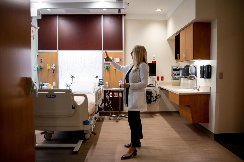 Nurse manager Cassidy Kotobalavu gives a tour of a room in the bone marrow transplant inpatient unit at the new Kathryn F. Kirk Center for Comprehensive Cancer Care and Women’s Cancers at Huntsman Cancer Institute in Salt Lake City on Monday.