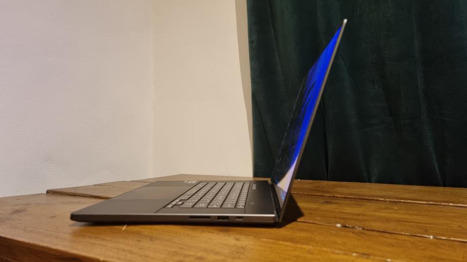 The Asus ROG Zephyrus 2024 in profile, showing the thinness of the display and base