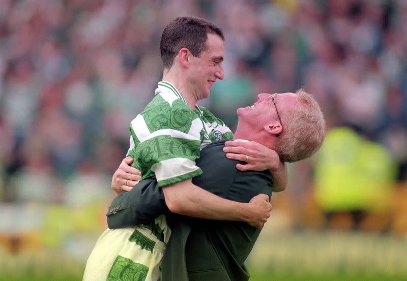 FILE PHOTO: Celtic manager Tommy Burns lifts skipper Paul McStay after the team defeated first division outsiders Airdrie 1-0 in the Scottish FA Cup final at Hampden Park