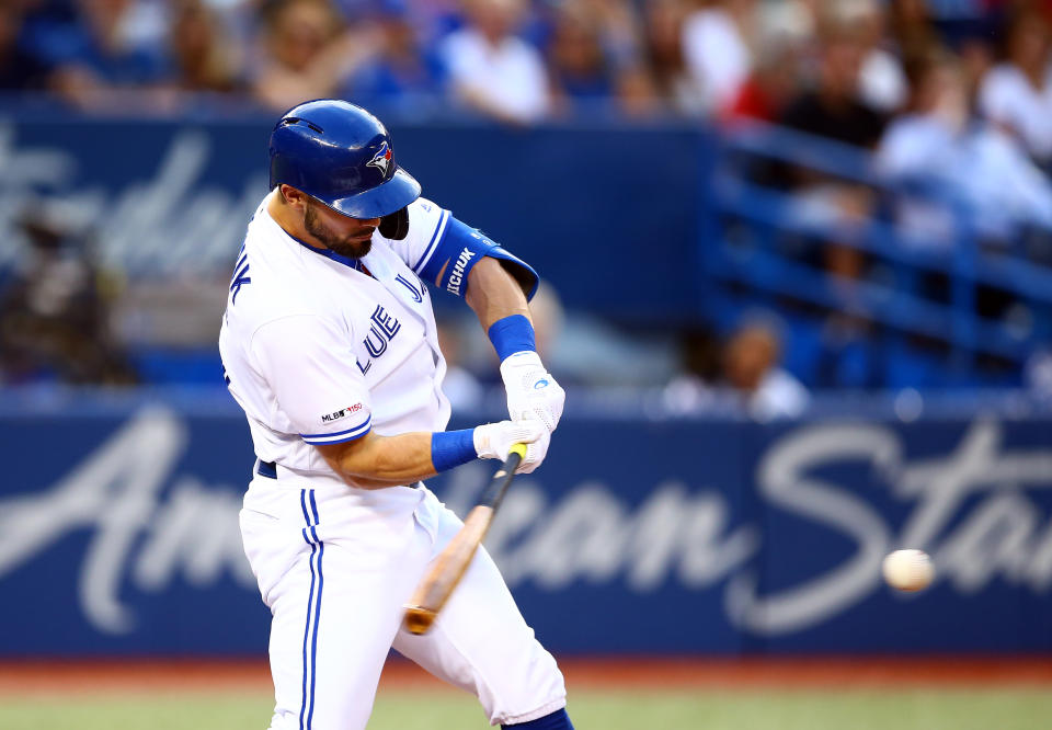 TORONTO, ON - AUGUST 13:  Randal Grichuk #15 of the Toronto Blue Jays hits a solo home run in the second inning during a MLB game against the Texas Rangers at Rogers Centre on August 13, 2019 in Toronto, Canada.  (Photo by Vaughn Ridley/Getty Images)