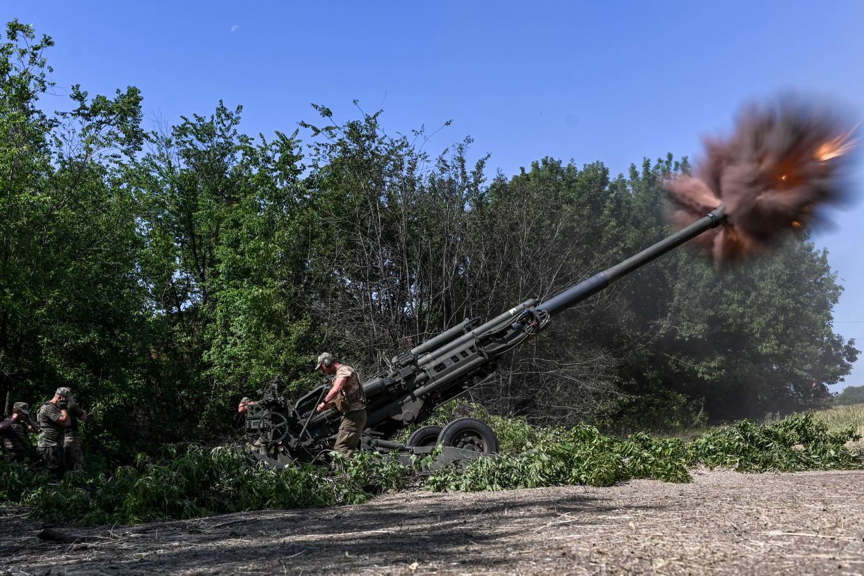 Ukrainian service members with an American supplied M777 Howitzer artillery system (Justin Yau/Sipa via AP)