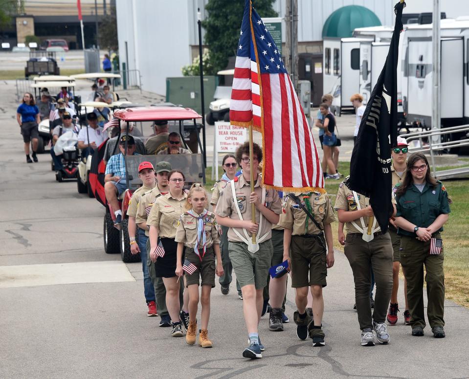 The Monroe County Fair Service Boy Scout Troop 1948 led the Veteran Day parade at the Monroe County Fair Monday.