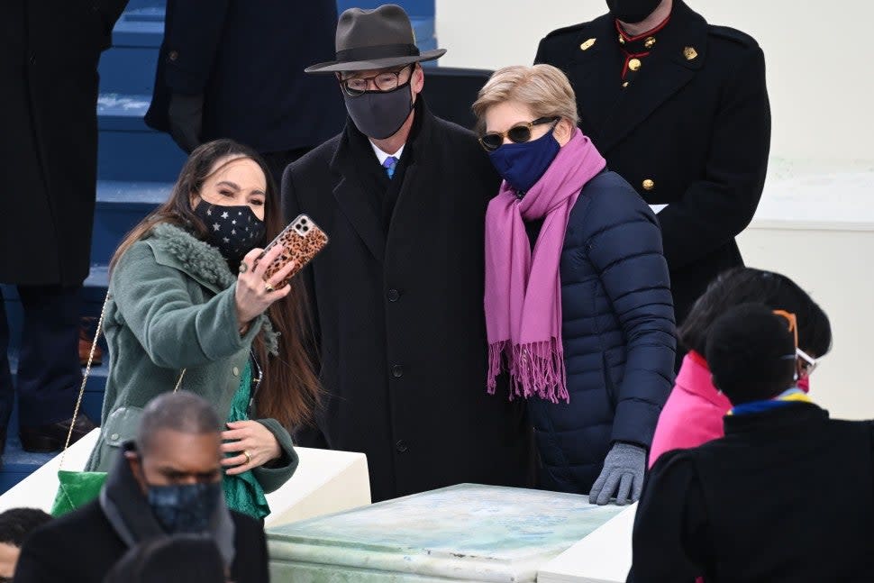 Elizabeth Warren (R), her husband and Meena Harris (L) are seen before President-elect Joe Biden arrives at the East Front of the US Capitol for his inauguration ceremony to be the 46th President of the United States in Washington, DC, on January 20, 2021. 