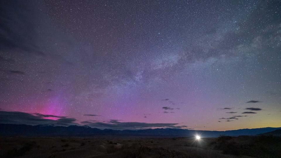  Purple aurora glow seen above the horizon from California's Death Valley. 