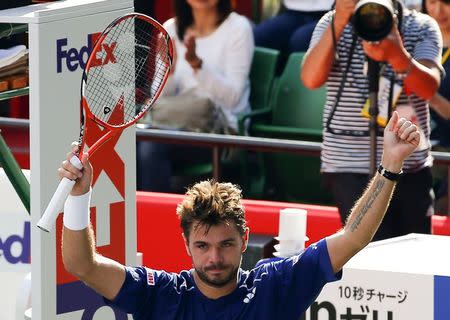 Switzerland's Stan Wawrinka reacts after defeating Austin Krajicek of the U.S. during their men's singles tennis match at the Japan Open championships in Tokyo October 9, 2015. REUTERS/Thomas Peter