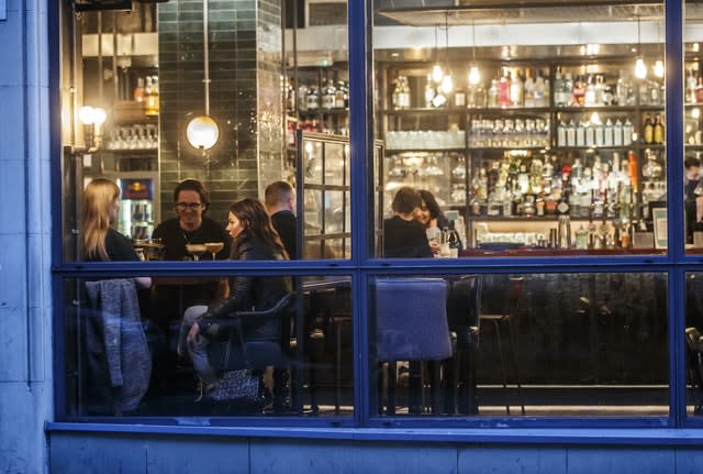 People drinking at a bar