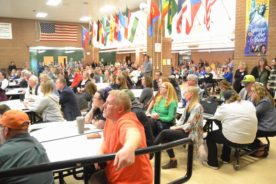 A crowd of about 260 people participated in a Facilities Planning Steering Committee listening session on Poudre School District consolidation options Thursday at Lincoln Middle School in Fort Collins.
