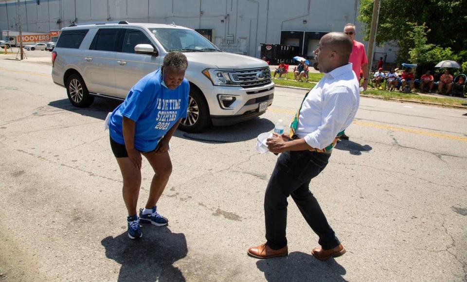 Kansas City Mayor Quinton Lucas danced with Teresa Mc Daniel at the JuneteenthKC 2021 Cultural Parade Saturday, June 12, 2021 in the Historic Jazz District near 18th and Vine.