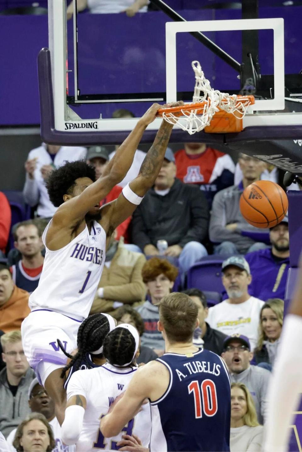 Washington forward Keion Brooks, who once played for UK, dunks during a game against Arizona in January 2023.