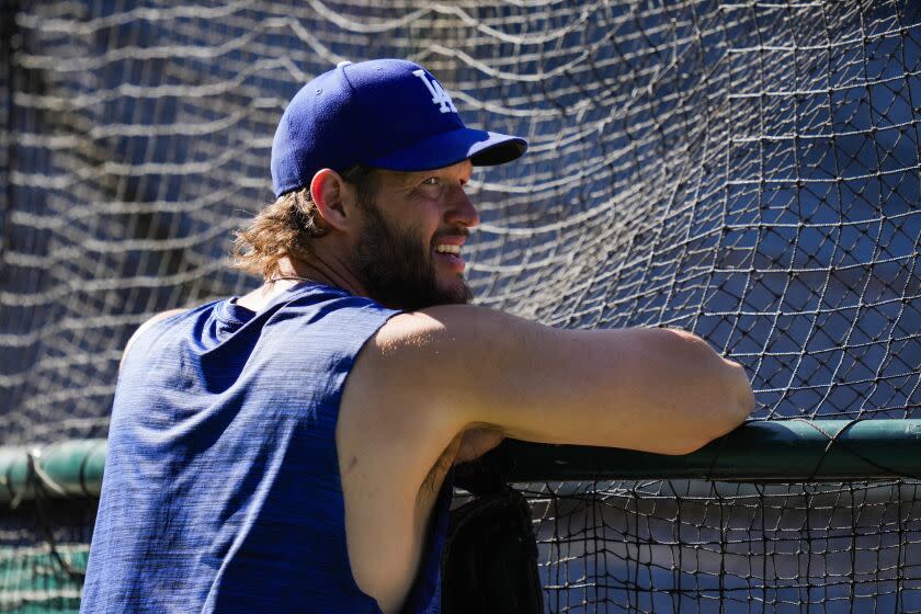 Los Angeles Dodgers relief pitcher Clayton Kershaw (22) participates in batting practice before a baseball game.
