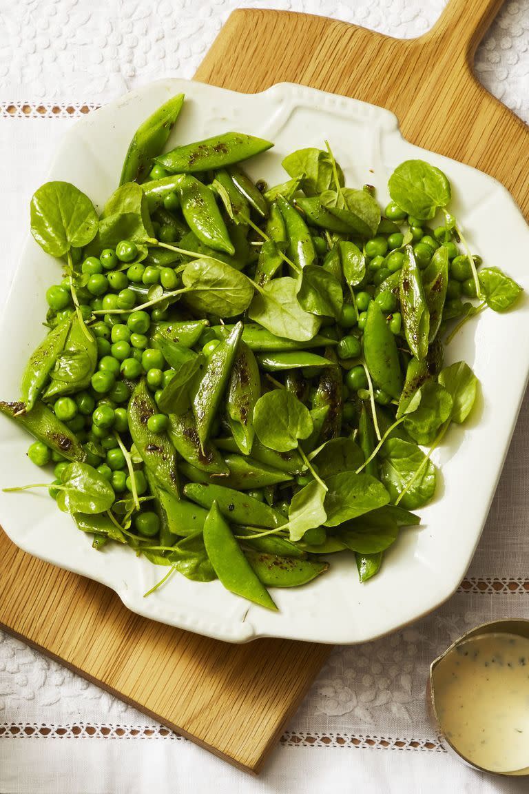 <p>Drizzled in bittersweet tarragon dressing is how we'll be having all our garden greens from now on. P.S., we won't tell if you want to reuse this <a href="https://www.goodhousekeeping.com/holidays/easter-ideas/g4160/easter-sides/" rel="nofollow noopener" target="_blank" data-ylk="slk:side dish recipe for Easter;elm:context_link;itc:0;sec:content-canvas" class="link ">side dish recipe for Easter</a> dinner.</p><p><em><a href="https://www.goodhousekeeping.com/food-recipes/easy/a26767475/charred-snap-peas-with-creamy-tarragon-dressing-recipe/" rel="nofollow noopener" target="_blank" data-ylk="slk:Get the recipe for Charred Snap Peas with Creamy Tarragon Dressing »;elm:context_link;itc:0;sec:content-canvas" class="link ">Get the recipe for Charred Snap Peas with Creamy Tarragon Dressing »</a></em></p>