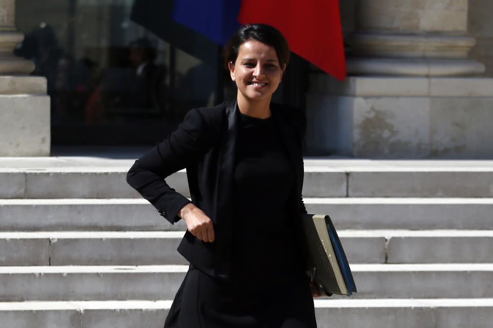 FILE - French Education Minister Najat Vallaud-Belkacem, a French-Moroccan, walks out at the end of the cabinet meeting at the Elysee Palace, in Paris, on May 10, 2017. During an electoral debate, a far-right candidate for the National Rally said on TV that it had been a “mistake” to have appointed Vallaud-Belkacem to the position of education minister in 2014-17, saying it was “not a good thing for the Republic.” (AP Photo/Francois Mori, File)