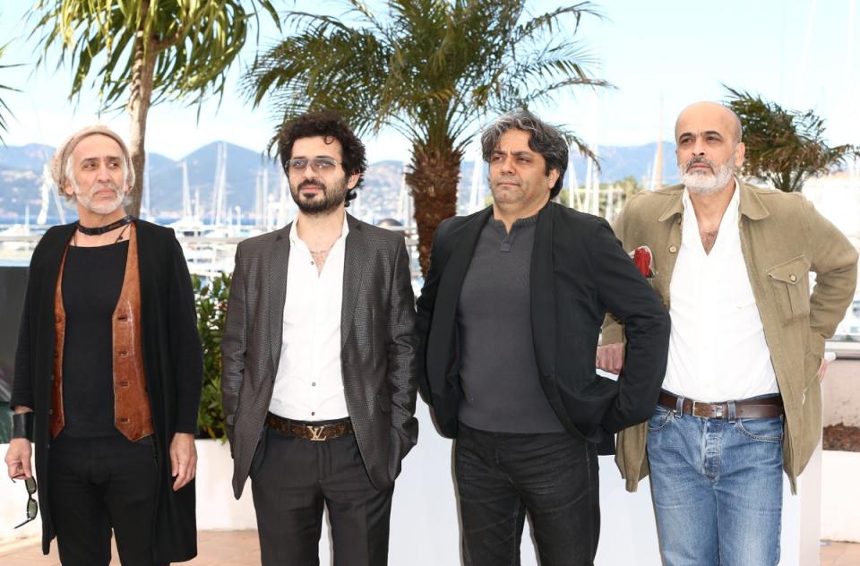 Mohammad Rasoulof (2nd from R) attends the photocall for ‘Dast-Neveshtehaa Nemisoosand’ during The 66th Annual Cannes Film Festival at Palais des Festivals on May 24, 2013 in Cannes (Getty Images)