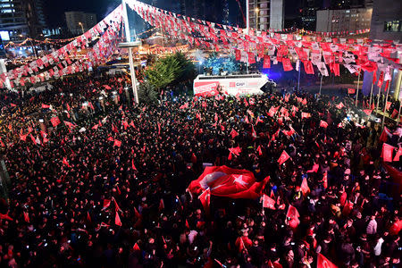 Supporters of the main opposition Republican People's Party (CHP) gather in front of the party's headquarters to celebrate the municipal elections results in Ankara, Turkey, March 31, 2019. REUTERS/Stringer