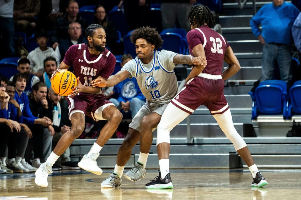 Drake's Atin Wright guards Texas Southern's Jonathan Cisse during a men's basketball game at the Knapp Center on Saturday, November 25, 2023 in Des Moines.