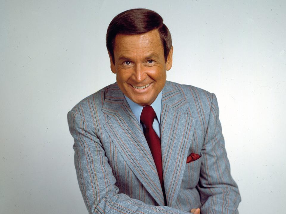 Bob Barker in a suit and tie