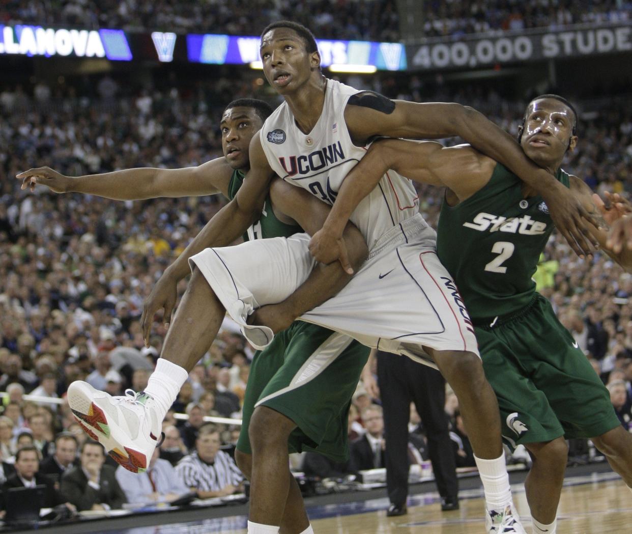 Connecticut's Hasheem Thabeet battles with Michigan State's Raymar Morgan and Marquise Gray for position during 1st half action between the Michigan State Spartans and the Connecticut Huskies in the Mens NCAA Final Four semi-final game, at Ford Field in Detroit on April 4, 2008.