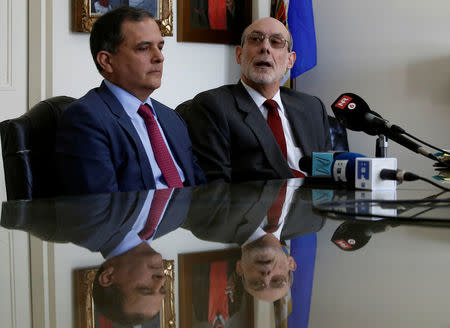 Adrian Simons and Jorge Villegas, lawyers of the Peruvian state speaks to the media after a hearing convened by the judges of the Inter-American Court of Human Rights regarding the pardon of the former Peruvian president Alberto Fujimori in San Jose, Costa Rica, February 2, 2018. REUTERS/Juan Carlos Ulate