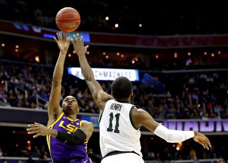 Mar 29, 2019; Washington, DC, USA; LSU Tigers guard Javonte Smart (1) shoots the ball against Michigan State Spartans forward Aaron Henry (11) during the first half in the semifinals of the east regional of the 2019 NCAA Tournament at Capital One Arena. Mandatory Credit: Geoff Burke-USA TODAY Sports