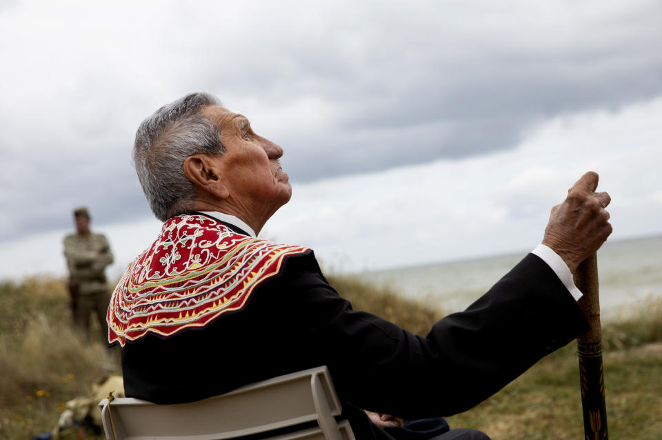 World War II D-Day veteran and Penobscot Elder from Maine, Charles Norman Shay participates in a Native American ceremony at his memorial overlooking Omaha Beach in Saint-Laurent-sur-Mer, Normandy, France, Friday, June 5, 2020. Saturday's anniversary of D-Day will be one of the loneliest remembrances ever, as the coronavirus pandemic is keeping almost everyone away, from government leaders to frail veterans who might not get another chance for a final farewell to their unlucky comrades. (AP Photo/Virginia Mayo)