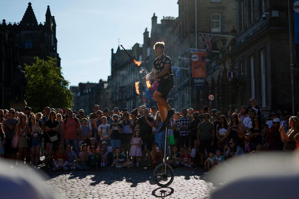 Performers on the Royal Mile at the Edinburgh Fringe this week (Getty Images)