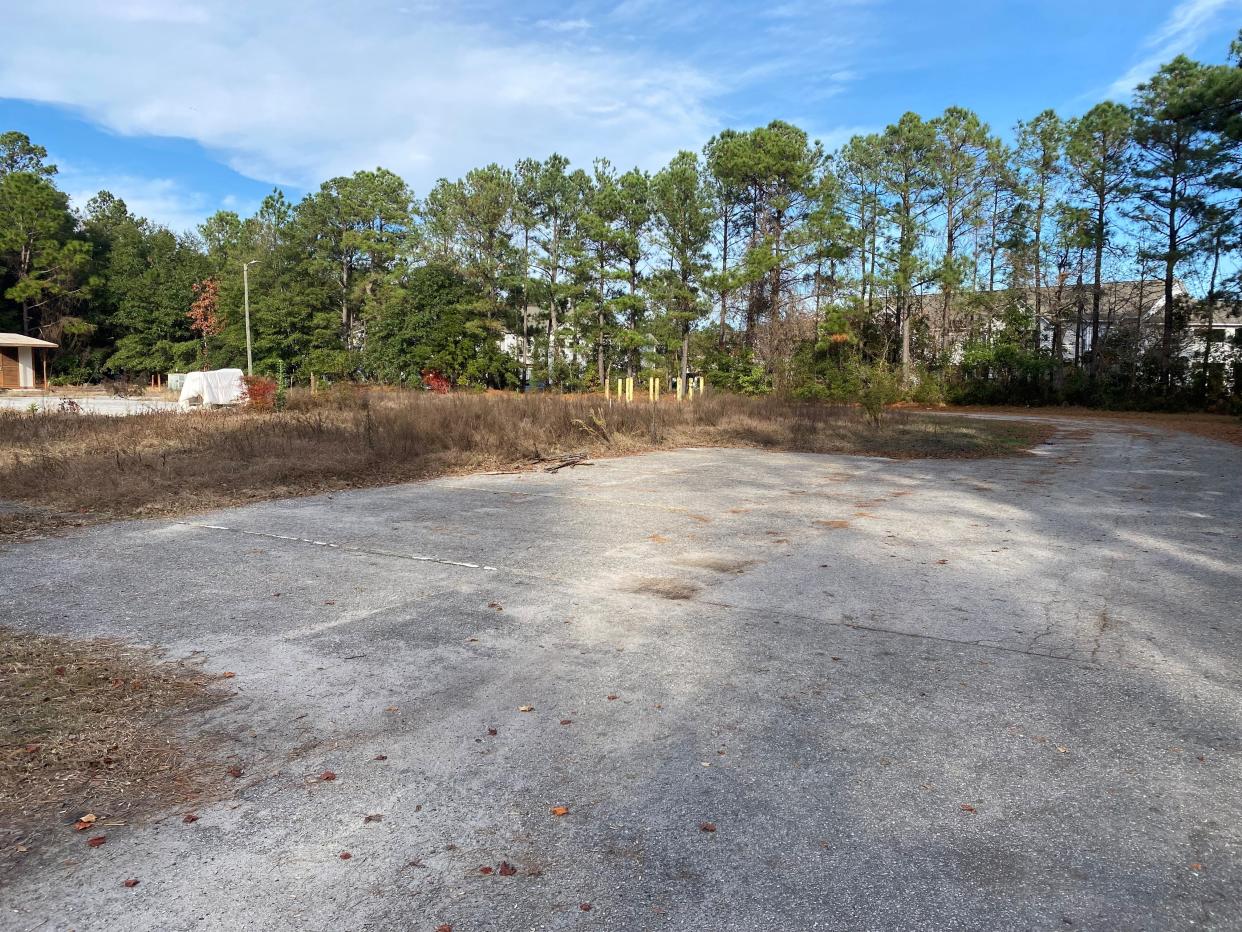 The site of a former fire station that will become the new location of a permanent supportive housing center at 3939 Carolina Beach Road.