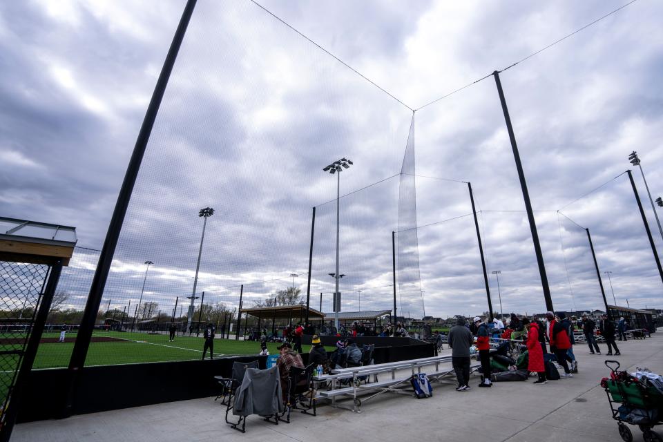 Spectators watch youth baseball games at GrimesPlex on April 20.