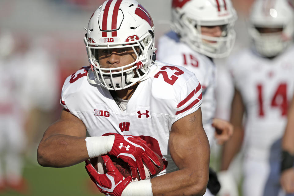 Wisconsin running back Jonathan Taylor (23) warms up before an NCAA college football game against Nebraska in Lincoln, Neb., Saturday, Nov. 16, 2019. (AP Photo/Nati Harnik)