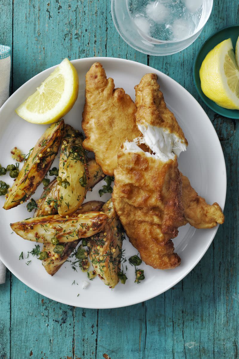 <p>Take fish and chips to the next level with this quick homemade meal.</p><p><em><a href="https://www.womansday.com/food-recipes/food-drinks/recipes/a58139/beer-battered-cod-roasted-potato-salad-recipe/?visibilityoverride" rel="nofollow noopener" target="_blank" data-ylk="slk:Get the Beer-Battered Cod and Roasted Potato Salad recipe.;elm:context_link;itc:0;sec:content-canvas" class="link ">Get the Beer-Battered Cod and Roasted Potato Salad recipe.</a></em></p>