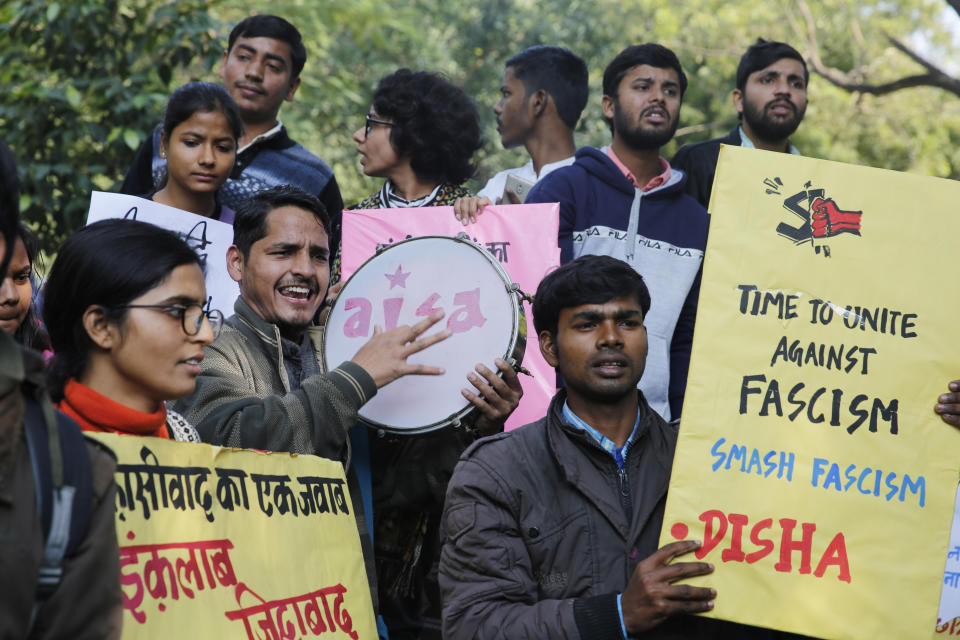 Allahabad University students hold placards during a protest against Sunday's assault by masked assailants at New Delhi's Jawaharlal Nehru University in Prayagraj, India, Monday, Jan. 6, 2020. Masked assailants beat students and teachers with sticks on the campus of the prestigious university in India’s capital, injuring more than 20 people in an attack opposition lawmakers are trying to link to the government. (AP Photo/Rajesh Kumar Singh)