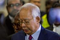 <p>Malaysia’s former Prime Minister Najib Razak speaks to the media regarding the case against him at the Kuala Lumpur Courts Complex on Wednesday (4 July) afternoon. (PHOTO: Fadza Ishak for Yahoo News Singapore) </p>