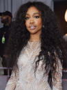 <p>For SZA’s big night at the Grammys, makeup artist Samuel Paul “wanted to up the etherealness with a flushed cheek and glossy pink nude lips.” To achieve this, he groomed the singer’s brows with <a rel="nofollow noopener" href="https://www.glossier.com/products/boy-brow" target="_blank" data-ylk="slk:Glossier Boy Brow;elm:context_link;itc:0;sec:content-canvas" class="link ">Glossier Boy Brow</a> in Brown ($16) and created a “bright blush” by layering Kyrolan Blusher in Mandarin on top of <a rel="nofollow noopener" href="https://www.glossier.com/products/cloud-paint" target="_blank" data-ylk="slk:Glossier Cloud Paint;elm:context_link;itc:0;sec:content-canvas" class="link ">Glossier Cloud Paint</a> in Beam ($18). (Photo: Kevin Mazur/Getty Images for NARAS) </p>