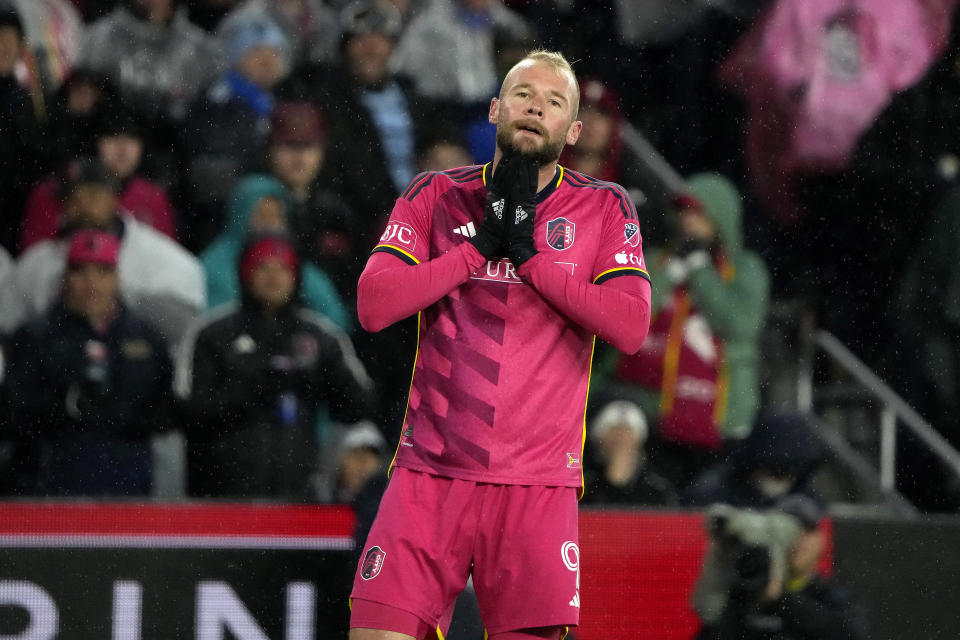 St. Louis City forward Joáo Klauss reacts after missing a goal attempt during the second half of an MLS playoff soccer match against Sporting Kansas City Sunday, Oct. 29, 2023, in St. Louis. (AP Photo/Jeff Roberson)