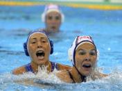 2016 Rio Olympics - Water Polo - Final - Women's Gold Medal Match USA v Italy - Olympic Aquatics Stadium - Rio de Janeiro, Brazil - 19/08/2016. Federica Radicchi (ITA) of Italy (L) and Kami Craig (USA) of USA compete. REUTERS/Laszlo Balogh