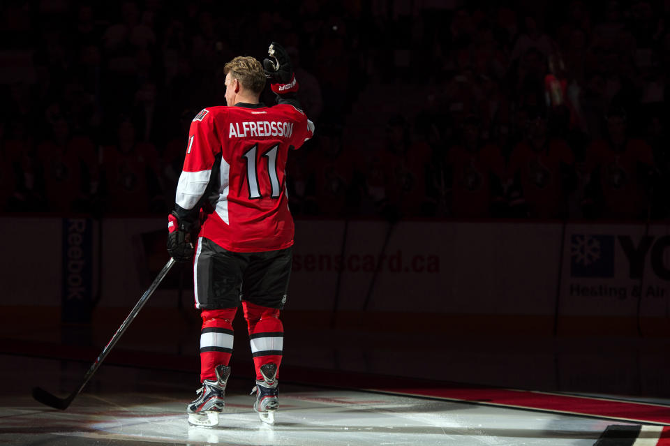 Dec 4, 2014; Ottawa, Ontario, CAN; Ottawa Senators former player Daniel Alfredsson (11) takes part in a pre-game ceremony prior to game against the New York Islanders at Canadian Tire Centre. (Marc DesRosiers-USA TODAY Sports)