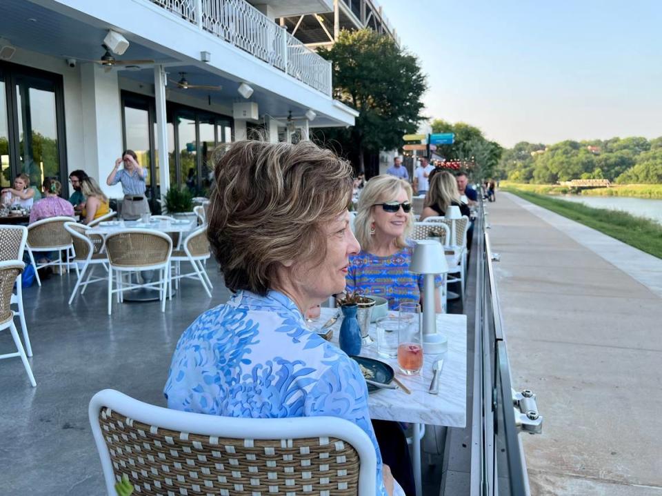 Quince’s restaurant patio lines the Clear Fork of the Trinity River, as seen May 22, 2023.