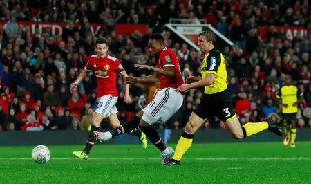 Soccer Football - Carabao Cup Third Round - Manchester United vs Burton Albion - Old Trafford, Manchester, Britain - September 20, 2017 Manchester United's Anthony Martial scores their fourth goal Action Images via Reuters/Jason Cairnduff