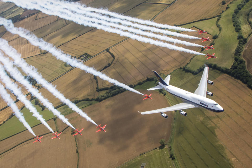 Image of the Royal Air Force Aerobatic team, the Red Arrows and a British Airways Boeing 747, seen here carrying out a flypast over the Royal International Air Tattoo at RAF Fairford (Picture: UK MOD/Crown 2019)