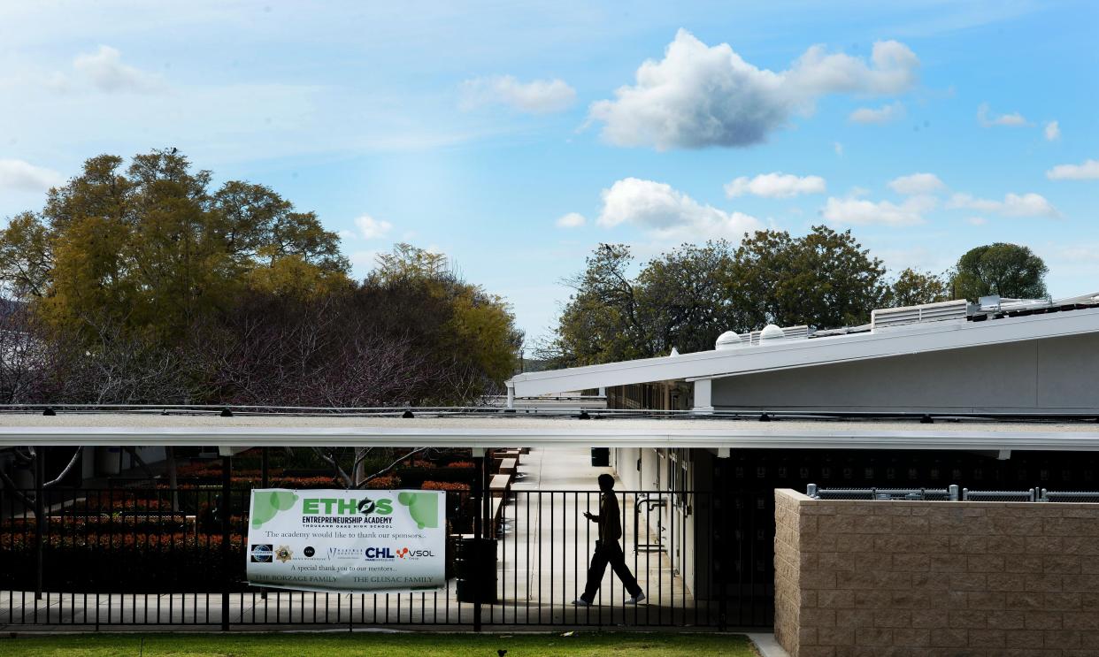 A student walks to class at Thousand Oaks High School.