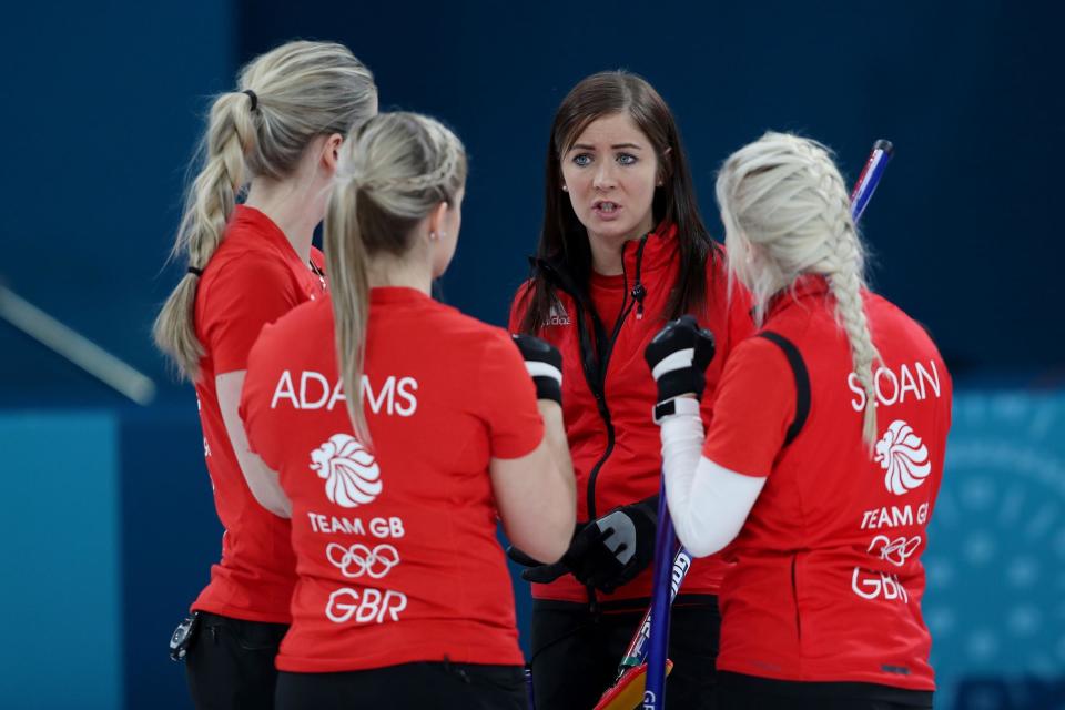 Ice and easy: Skip Eve Muirhead speaks to the team after Great Britain beat Japan in today’s round-robin match: PA